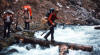 Carl & Jim waiting to cross on a log