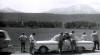 Spanish Peaks and southern Rockies  Surrounding Bob Brown's car are, l to r: Bob Schmalz, Boies, Kyle, Rich, Rick, Joe T, Bob Brown, Bernie