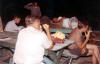 Campground. Earl, Rit (foregnd), Jim, Russ Dutcher (napping), Joe T