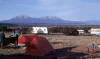 Camping at Walsenberg, Colorado (Spanish Peaks.) Debbie Van Vleet and Archie Richardson folding their tent. 