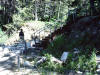 Perry Rahn at the fault scarp (right side up) near Quake Lake