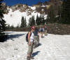 Ascending snow at Alta. On the skyline is Duff's Bench and a thrust fault under the Mineral Forks Formation. Sarah is facing the camera.