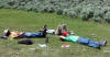 Terryl, Justin G, and Justin K relaxing on alluvium, Wildhorse project