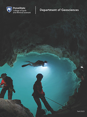 the cover showing people scuba diving in blue waters in a cave